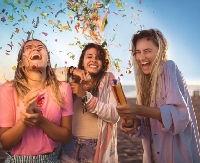 How to make the most out of your year - 2021 - young people celebrating at the beach with confetti